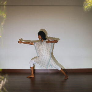 Fateh Jot aligning to direction and focus in archer pose